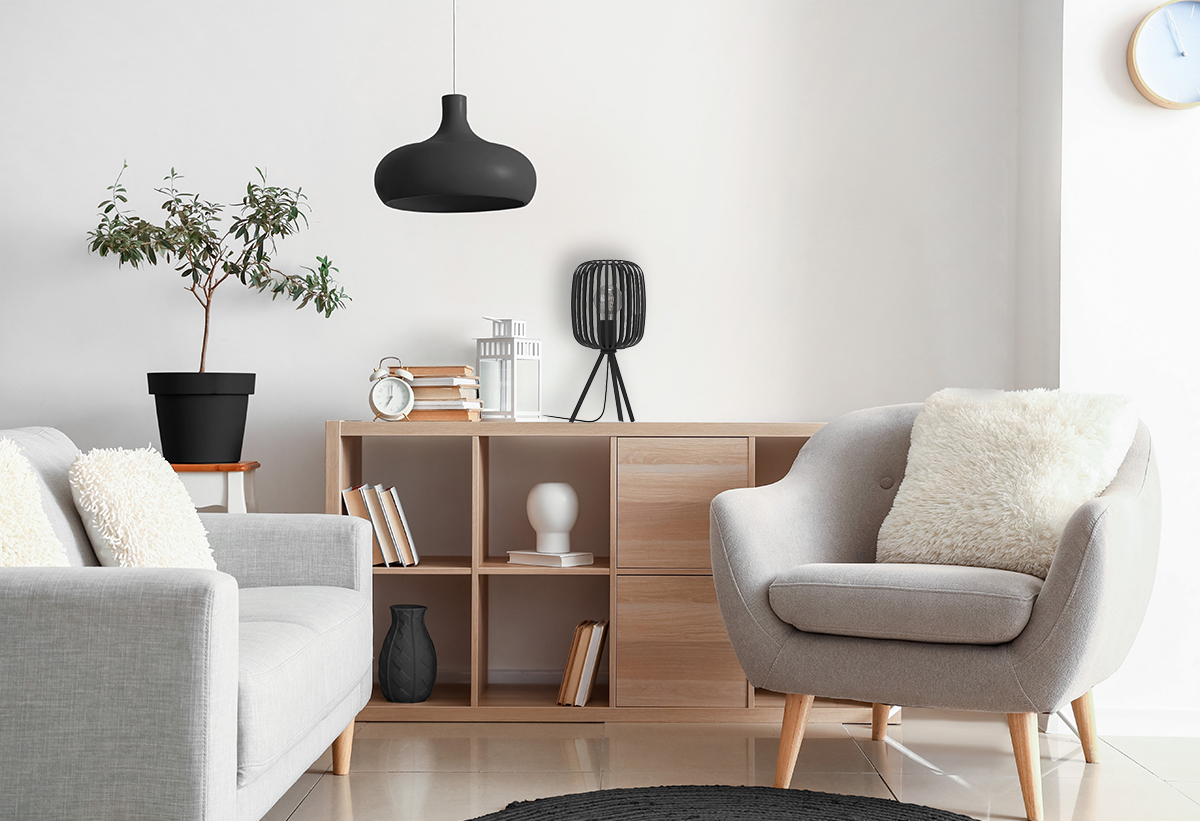 Απεικονίζεται το φωτιστικό σε ενα επιπλο.